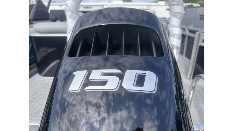 Slide: The Image of 2025 Tahoe Pontoon LTZ Cruise with 150 horsepower engine, close-up view. - 15