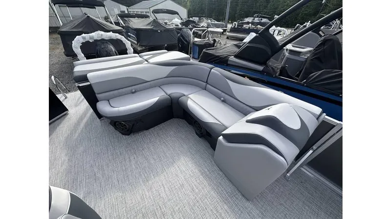 Slide: The Image of 2025 Tahoe Pontoon LTZ Cruise with sleek gray seating and modern design. - 9