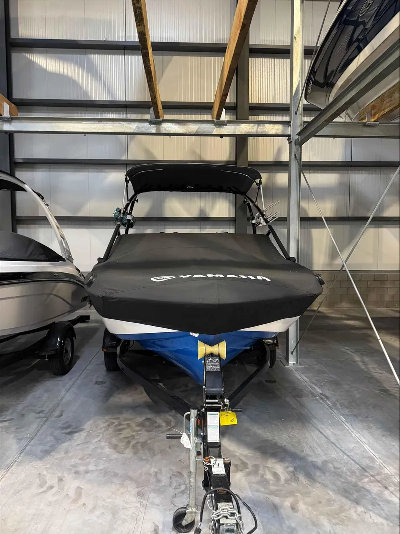 Slide: The Image of 2015 Yamaha AR192 boat with cover in storage facility. - 3