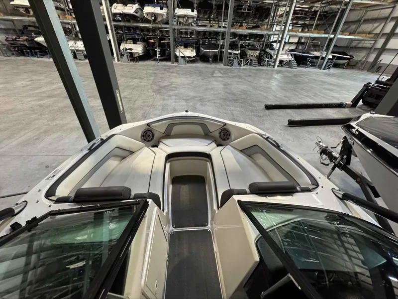 Slide: The Image of 2015 Yamaha Boats AR192 interior view in a spacious storage facility. - 8