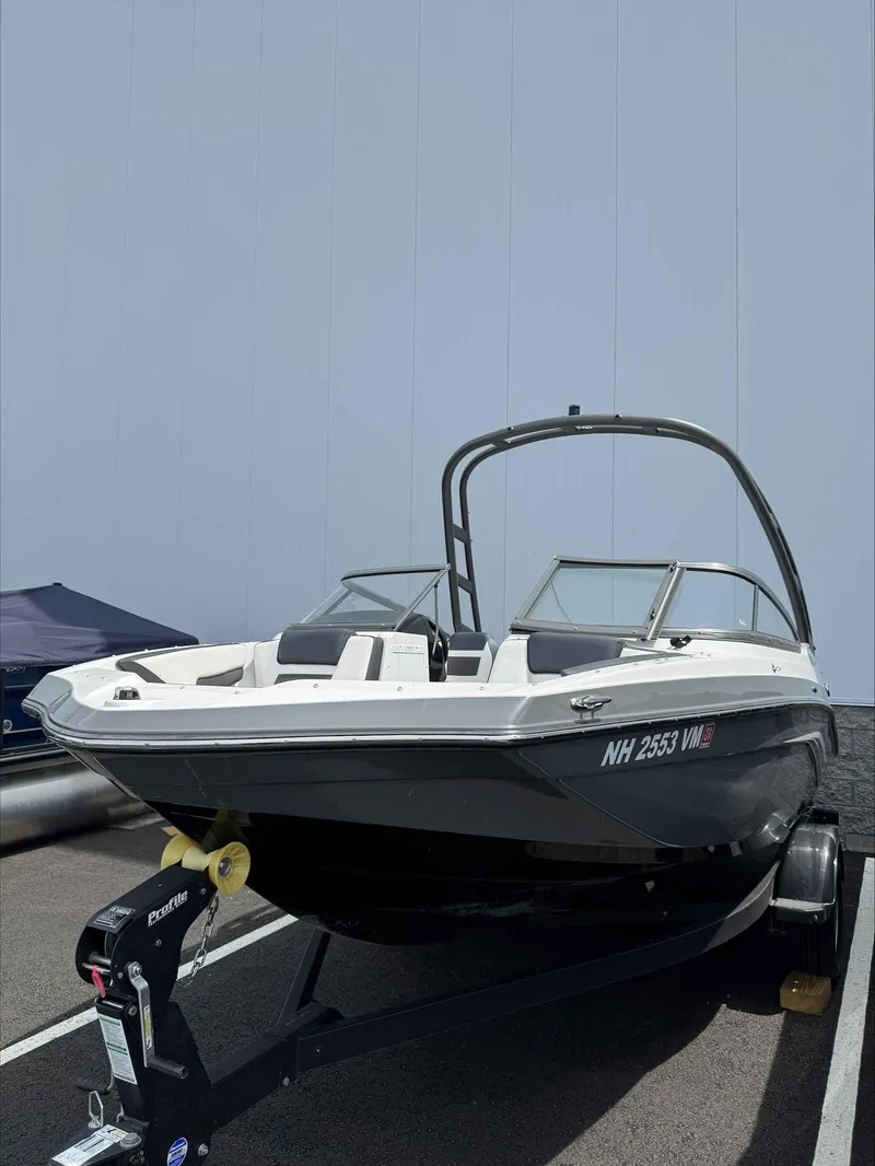 Slide: The Image of 2019 Yamaha AR195 boat on trailer, parked outdoors. - 3