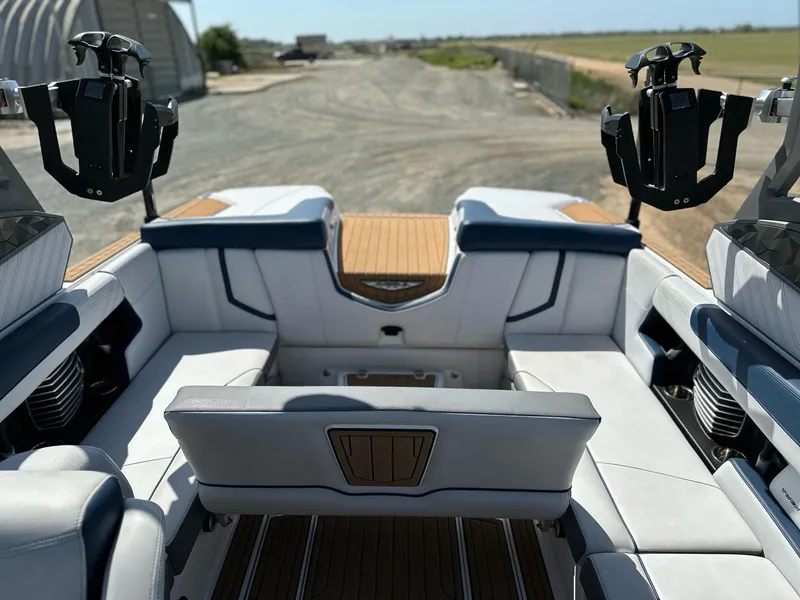 Slide: The Image of 2019 Nautique Super Air G23 boat interior with sleek seating and modern design. - 14