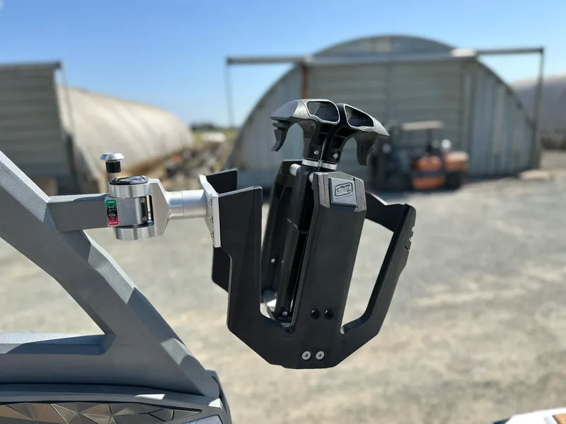 Slide: The Image of 2019 Nautique Super Air G23 wakeboard rack in a sunny outdoor setting. - 24