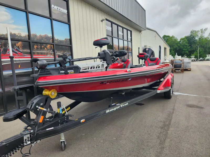 Slide: The Image of 2022 Ranger Z521L RANGER CUP EQUIPPED boat on trailer, parked outside a building. - 1