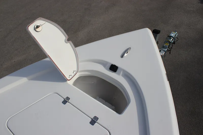 Slide: The Image of 2025 Sea Pro 210 boat bow storage compartment with open hatch. - 11