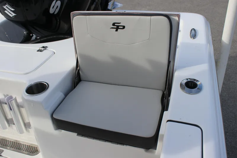 Slide: The Image of 2025 Sea Pro 210 boat seat with cup holder and storage compartment. - 22