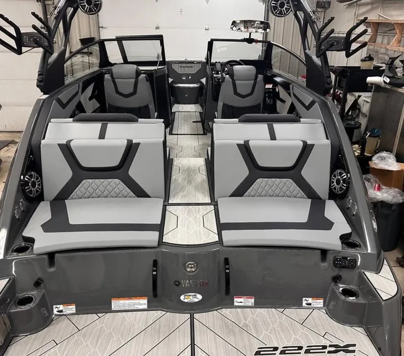 Slide: The Image of 2025 Yamaha Boats 222XD interior with sleek gray seating and modern design. - 2