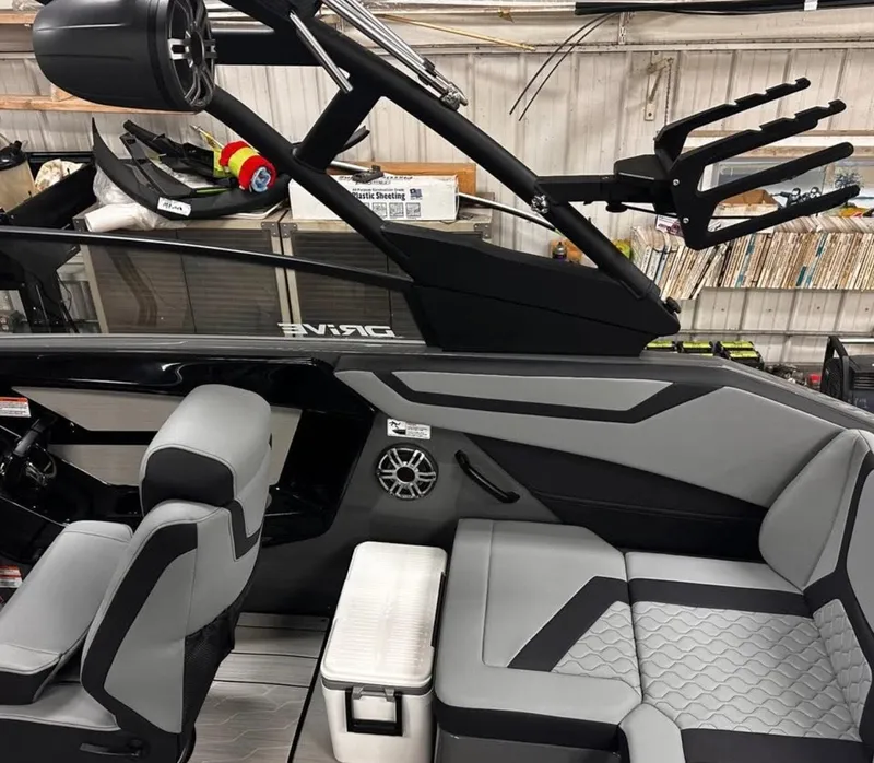 Slide: The Image of 2025 Yamaha Boats 222XD interior with sleek seating and modern design features. - 7