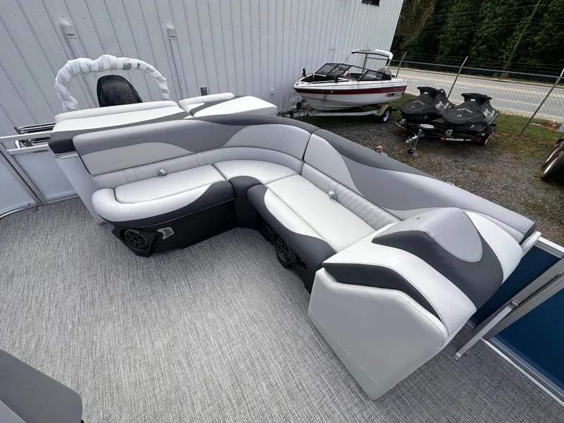 Slide: The Image of 2025 Tahoe Pontoon LTZ Cruise with sleek, modern seating design on a boat deck. - 6