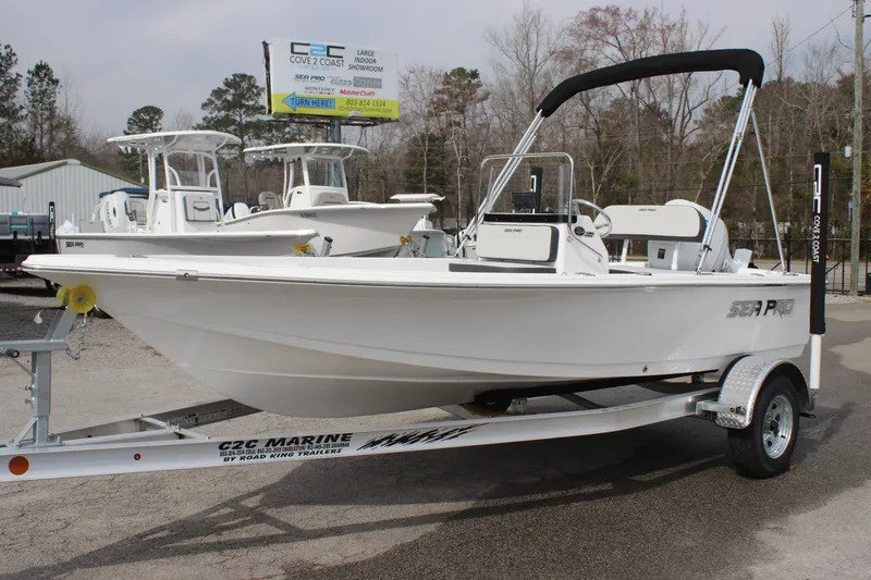 Slide: The Image of 2025 Sea Pro 172 boat on trailer, displayed outdoors at a dealership. - 3