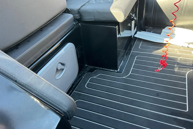 Slide: The Image of Interior of 2025 Highfield Sport 520 boat, featuring seating and storage compartments. - 7