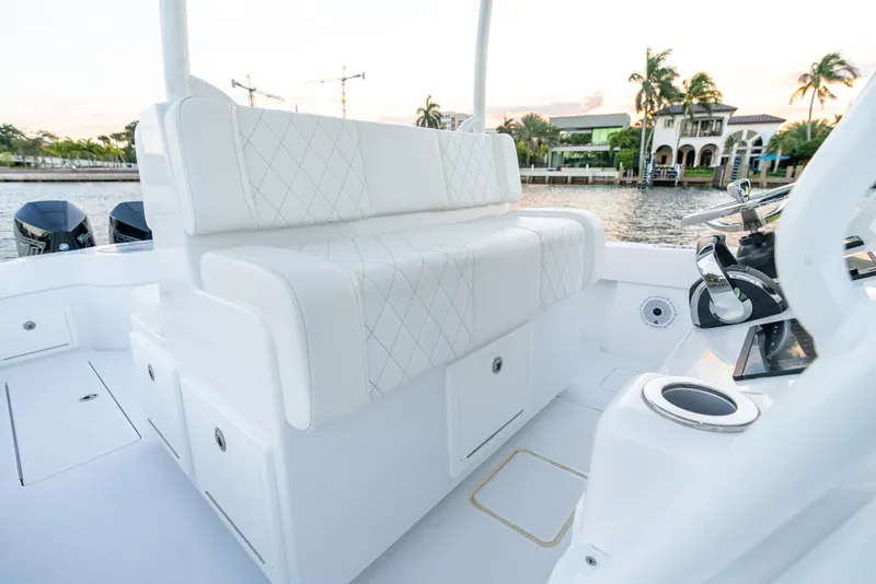 Slide: The Image of Luxurious seating on 2022 Onslow Bay 41 TE boat, with waterfront view. - 16