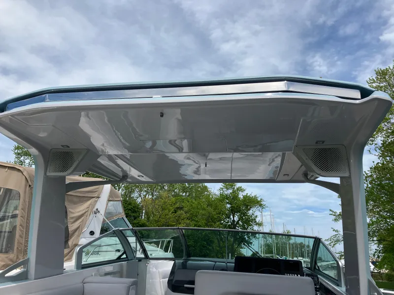 Slide: The Image of 2022 Aviara AV32 OB boat with sleek canopy and modern design. - 23
