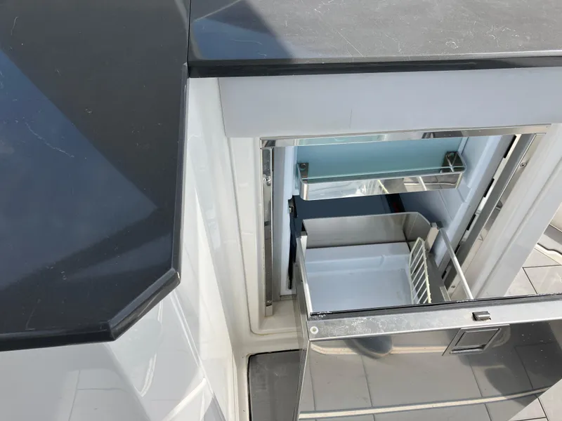 Slide: The Image of Open drawer refrigerator on 2022 Aviara AV32 OB boat deck. - 34