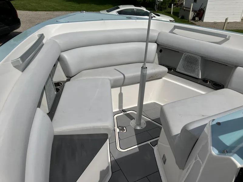 Slide: The Image of 2022 Aviara AV32 OB boat interior with cushioned seating and modern design. - 40