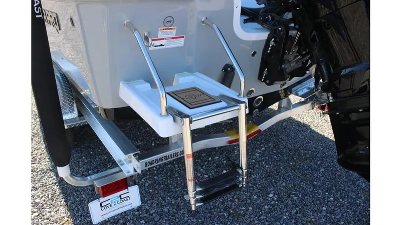 Slide: The Image of 2025 Sea Pro 230 Bay boat with a rear boarding ladder and motor mount. - 11