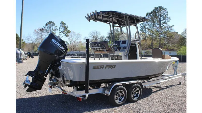 Slide: The Image of 2025 Sea Pro 230 Bay boat on trailer with Suzuki outboard motor. - 3
