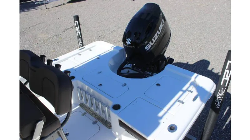 Slide: The Image of 2025 Sea Pro 230 Bay boat with Suzuki outboard motor, featuring a spacious deck layout. - 6