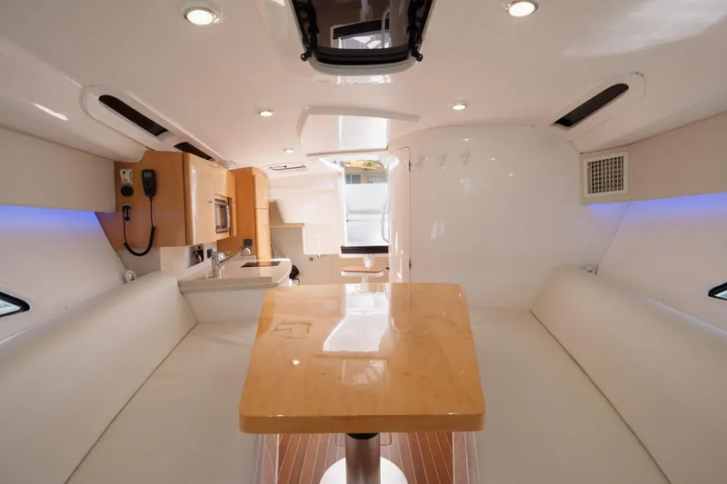 Slide: The Image of Luxurious interior of a 2013 Intrepid 400 Cuddy boat with modern amenities. - 29