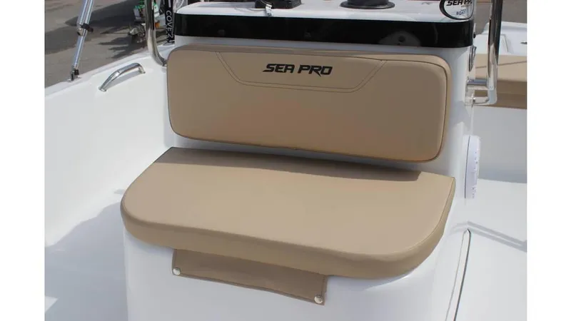 Slide: The Image of 2025 Sea Pro 172 boat seat with beige cushions and logo. - 14