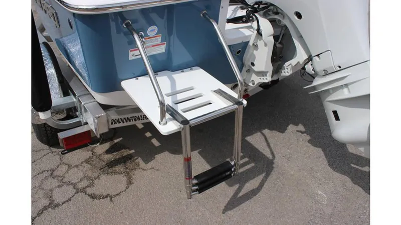 Slide: The Image of Rear view of 2025 Sea Pro 172 boat with swim ladder and motor. - 6