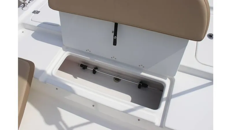 Slide: The Image of 2025 Sea Pro 172 boat storage compartment with beige seating. - 9