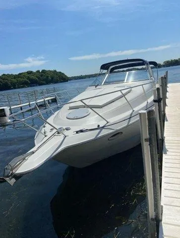 Slide: The Image of 1994 Chris-Craft 340 Crowne boat docked on a sunny day. - 13