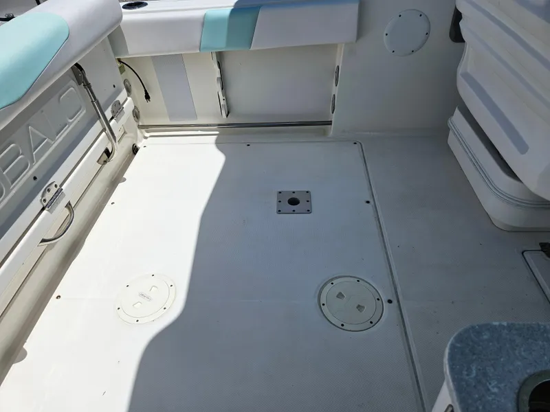 Slide: The Image of 2015 Robalo R247 Dual Console boat with Yamaha outboard engine on trailer. - 21