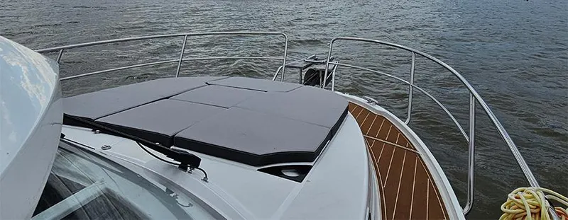 Slide: The Image of 2023 Jeanneau NC 1095 Fly boat deck with sleek design on water. - 18