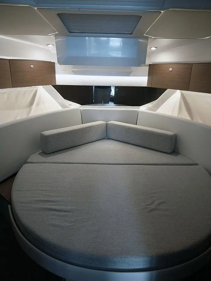 Slide: The Image of 2023 Jeanneau NC 1095 Fly cabin interior with modern design and comfortable seating. - 9