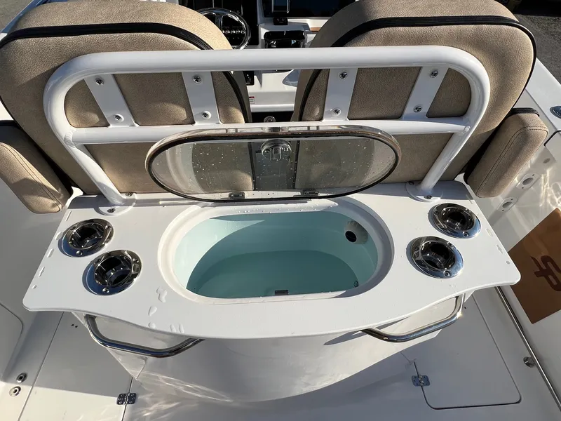 Slide: The Image of 2022 Sea Pro 259 Deep V Series CC boat with livewell and rod holders. - 3