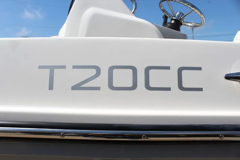 Slide: The Image of 2021 Bayliner T20CC boat with steering wheel, close-up view. - 16