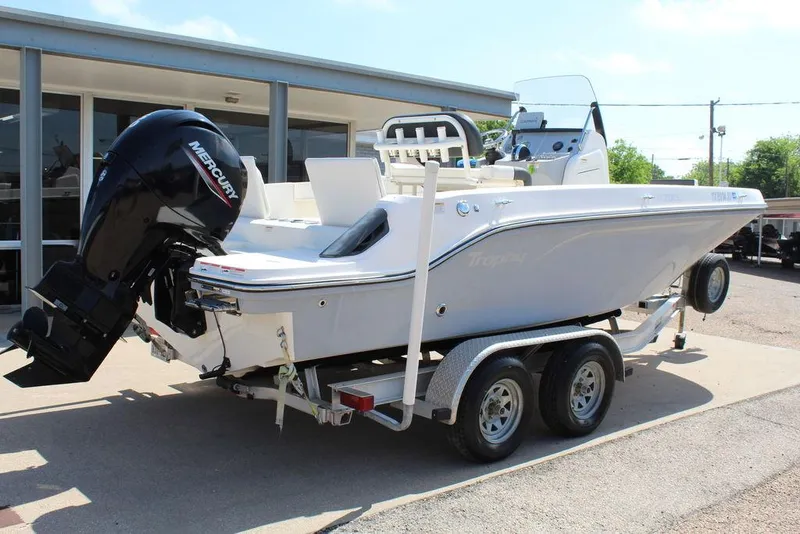 Slide: The Image of 2021 Bayliner T20CC boat on trailer with Mercury outboard motor. - 7