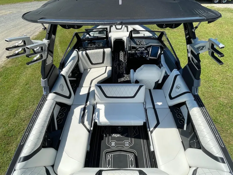 Slide: The Image of Luxurious interior of a 2021 Tigé 23ZX boat with sleek seating and modern design. - 13