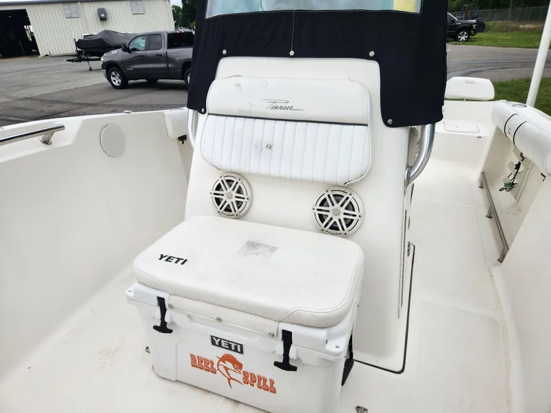 Slide: The Image of 2008 Pioneer 197 Sportfish boat interior with Yeti cooler and seating. - 10