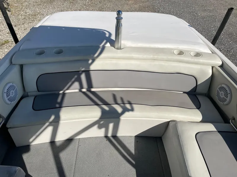 Slide: The Image of 1999 MasterCraft Prostar 205 boat interior with gray and white seating. - 5