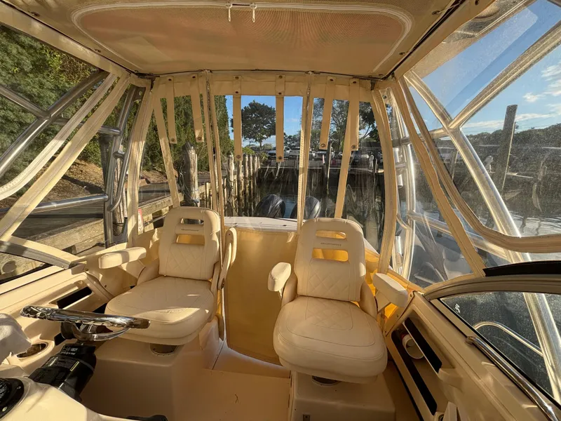 Slide: The Image of Interior of 2021 Grady-White Gulfstream 232 boat with two cushioned seats. - 30