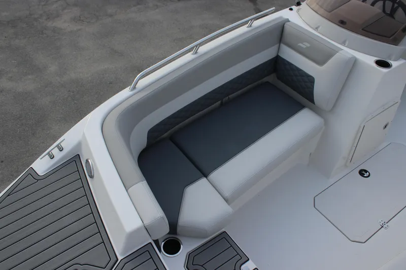 Slide: The Image of 2025 Starcraft SVX 191 OB boat interior with gray seating and sleek design. - 7