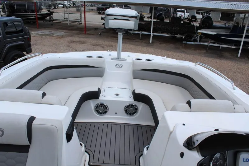 Slide: The Image of 2022 Hurricane SunDeck Sport 192 RL OB boat interior with seating and speakers. - 5