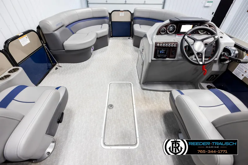 Slide: The Image of 2021 Trifecta 22 CS pontoon boat interior with gray seating and modern dashboard. - 18