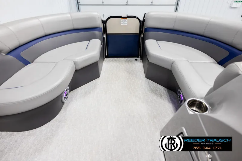 Slide: The Image of 2021 Trifecta 22 CS boat interior with gray seating and blue accents. - 19