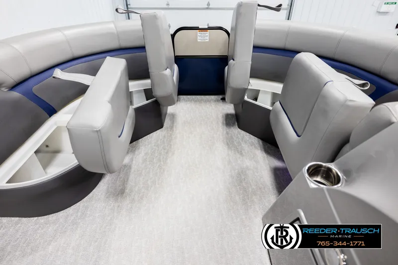 Slide: The Image of Interior of 2021 Trifecta 22 CS pontoon boat with gray seating and cup holders. - 20