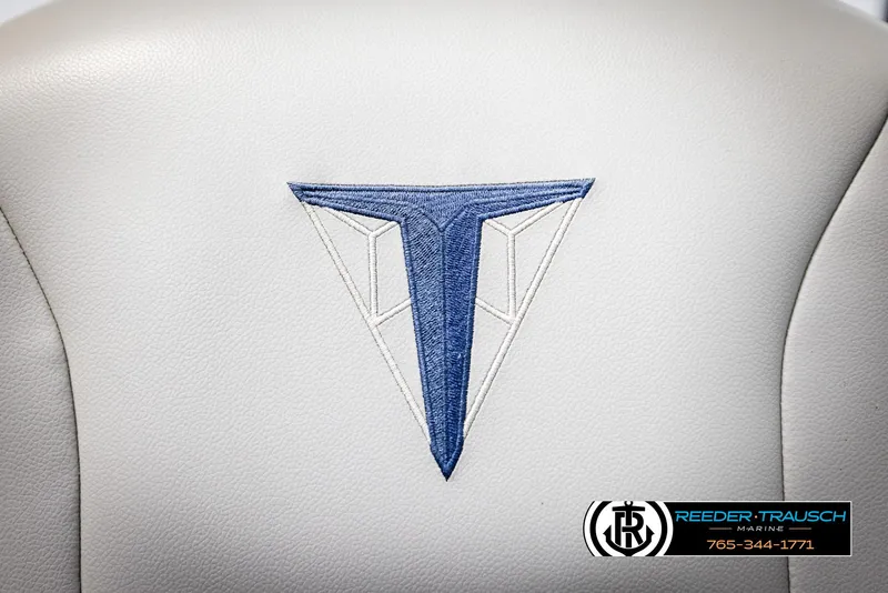 Slide: The Image of 2021 Trifecta 22 CS boat seat with blue embroidered logo. - 36