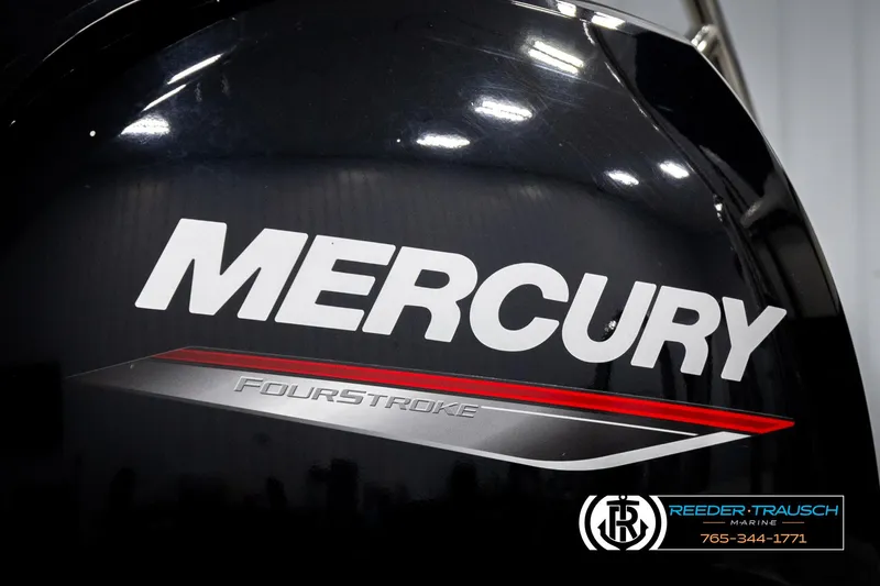 Slide: The Image of Mercury FourStroke engine close-up with Reeder-Trausch Marine logo, 2021 Trifecta 22 CS. - 43