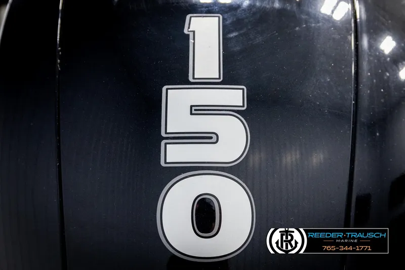 Slide: The Image of Close-up of 150 horsepower engine detail on 2021 Trifecta 22 CS boat. - 44