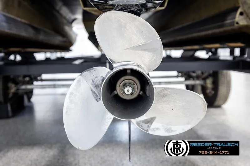 Slide: The Image of Propeller of 2021 Trifecta 22 CS boat, close-up view in a showroom. - 45