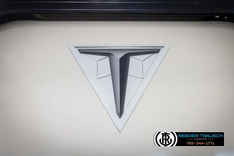 Slide: The Image of 2021 Trifecta 22 CS logo on a light background with Reeder-Trausch Marine branding. - 46