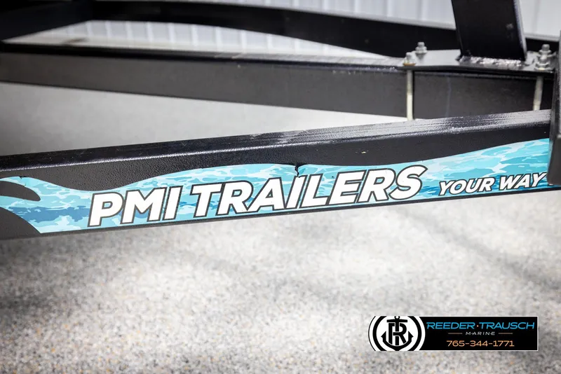 Slide: The Image of PMI Trailers branding on Trifecta 22 CS, 2021 model, with Reeder-Trausch Marine logo. - 49