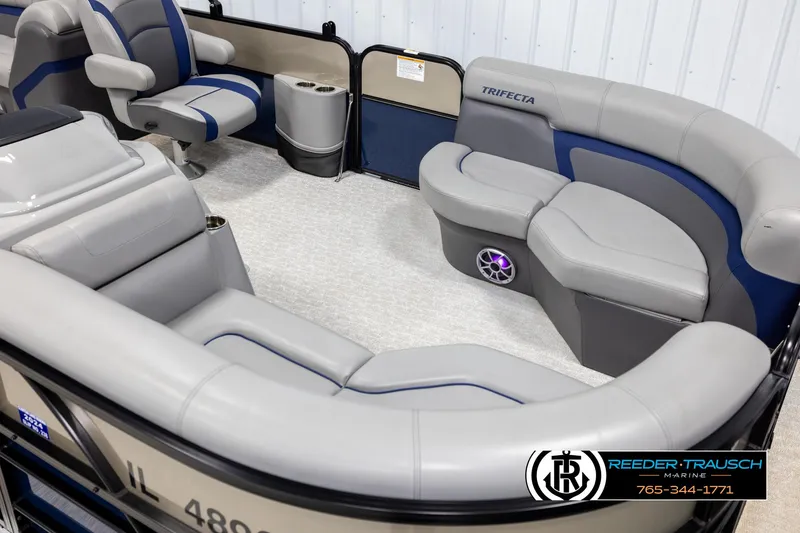 Slide: The Image of 2021 Trifecta 22 CS pontoon boat interior with gray seating and modern design. - 8