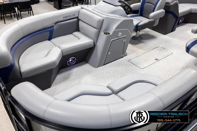Slide: The Image of 2021 Trifecta 22 CS pontoon boat interior with gray seating and modern design. - 9